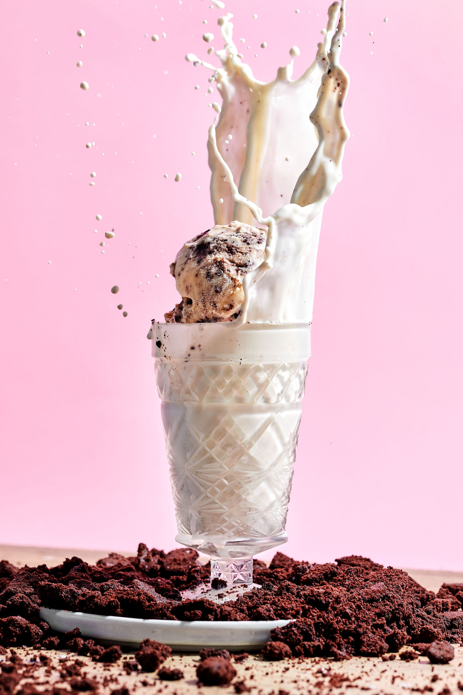 scoops of cookies & cream ice cream with a splash of milk and chocolate cookie crumbles